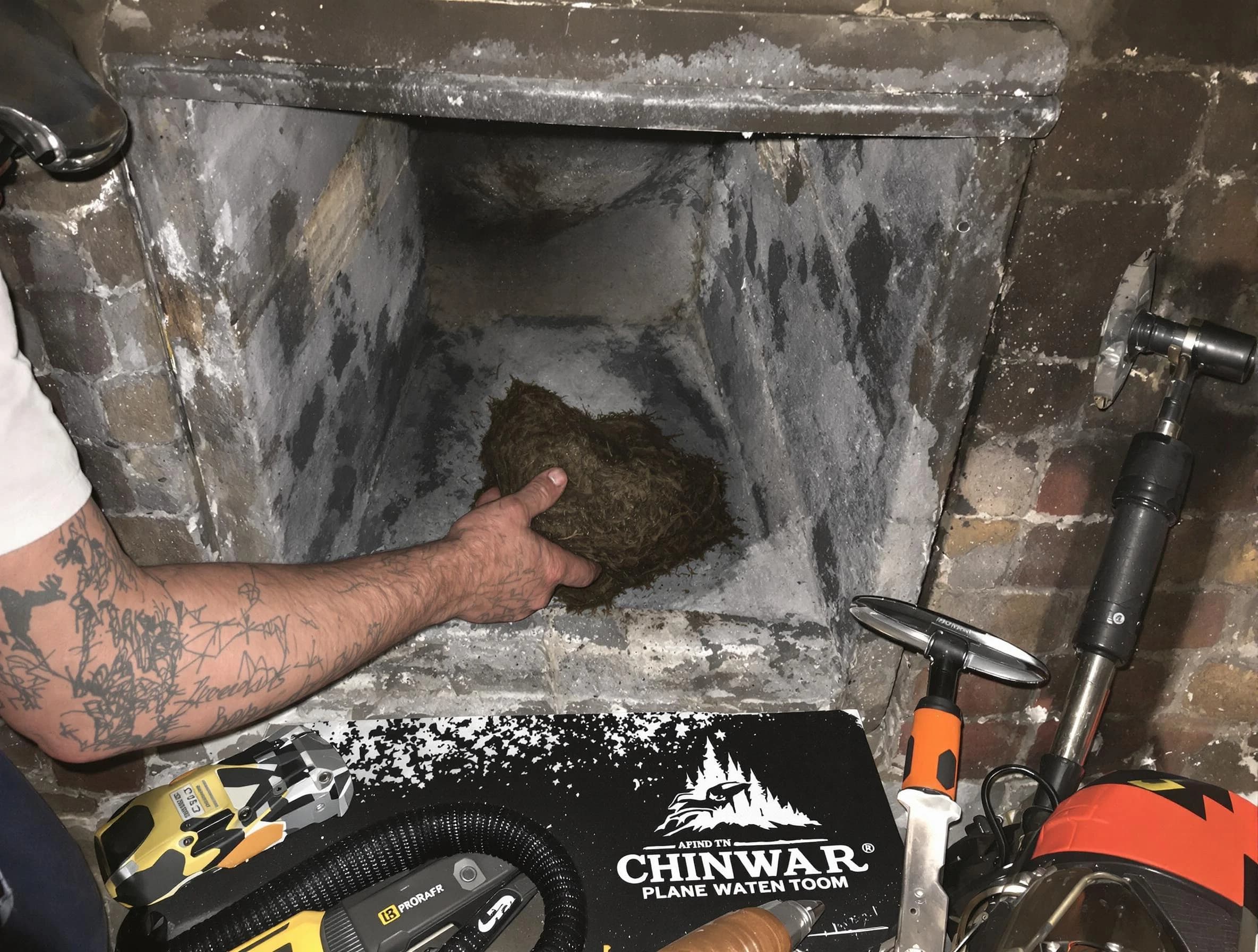 Nichols Hills Chimney Sweep safely removing debris and screening chimney in Nichols Hills, OK
